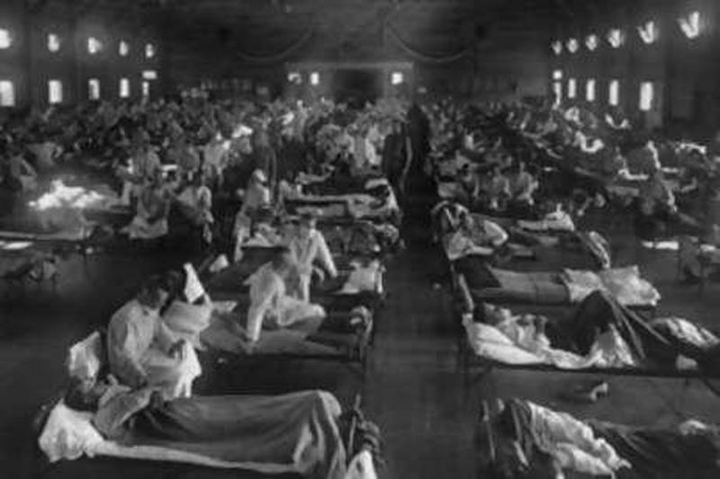 Spanish Flu victims crowd an emergency hospital in Kansas in 1918. The virus killed nearly 50 million people.