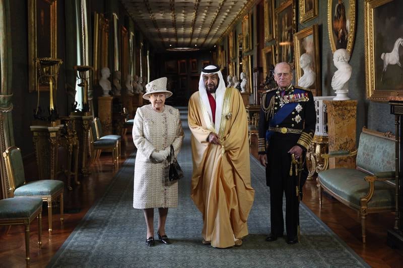 Queen Elizabeth II and Prince Philip with former UAE president Sheikh Khalifa. Getty