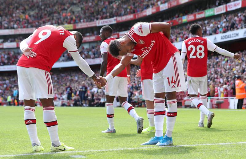 Arsenal's Pierre-Emerick Aubameyang celebrates scoring his side's second goal of the game with team-mate Alexandre Lacazette during the Premier League match at The Emirates Stadium, London. PRESS ASSOCIATION Photo. Picture date: Saturday August 17, 2019. See PA story SOCCER Arsenal. Photo credit should read: Yui Mok/PA Wire. RESTRICTIONS: EDITORIAL USE ONLY No use with unauthorised audio, video, data, fixture lists, club/league logos or "live" services. Online in-match use limited to 120 images, no video emulation. No use in betting, games or single club/league/player publications.