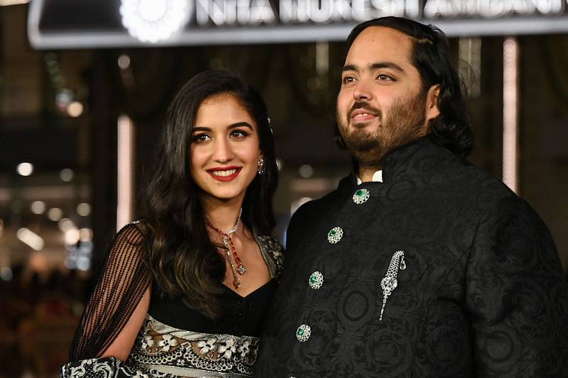 Anant Ambani, son of Indian billionaire Mukesh Amani, with his fiance Radhika Merchant. AFP
