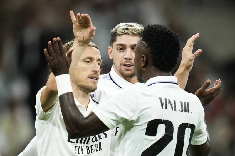 Real Madrid's Luka Modric (l) celebrates with teammates after scoring the first goal in the 5-1 Champions League win against Celtic at the Santiago Bernabeu on November 2, 2022. AP