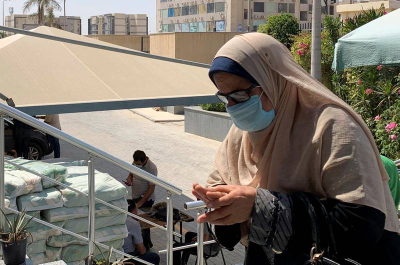 A woman wears a protective face mask, amid concerns over the coronavirus disease in Cairo, Egypt. Reuters