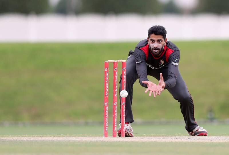 Dubai, United Arab Emirates - March 28, 2019: UAE's Ahmed Raza gathers the ball during the game between UAE and USA. Thursday the 28th of March 2019, The Sevens, Dubai. Chris Whiteoak / The National