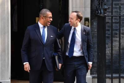 Mr Cleverly and then-health secretary Matt Hancock leave 10 Downing Street following the first cabinet meeting with new prime minister Boris Johnson in July 2019. Getty Images