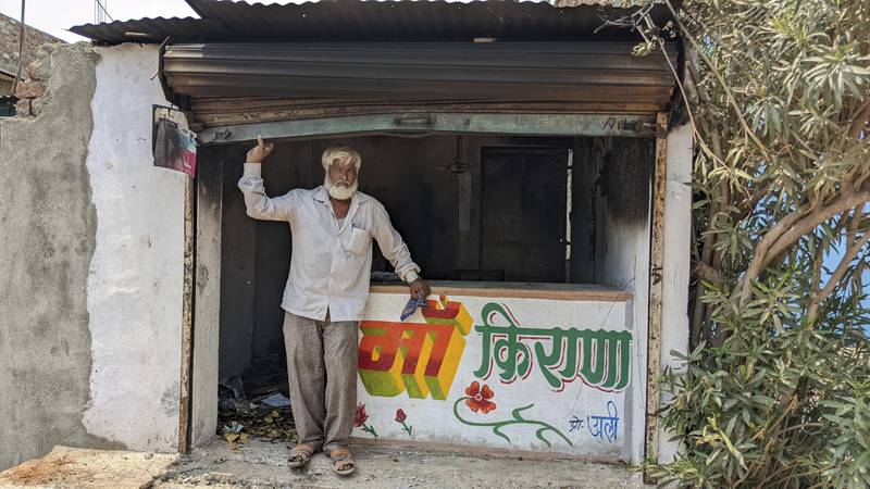 Nawab Khan stands by his shop which was vandalised on April 10 in Khargone, in Madhya Pradesh. Shops and properties have again been damaged in the state in clashes between Muslims and Hindus. AP