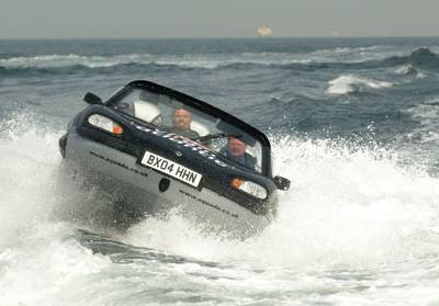 Sir Richard Branson pilots his Gibbs Aquada amphibious car during a record-breaking 2004 crossing of the English Channel.