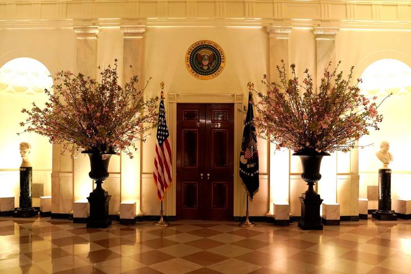 Cherry blossom flowers decorate the Cross Hall for the State Dinner for France's President Emmanuel Macron at the White House in Washington, US, April 23, 2018. Joshua Roberts / Reuters