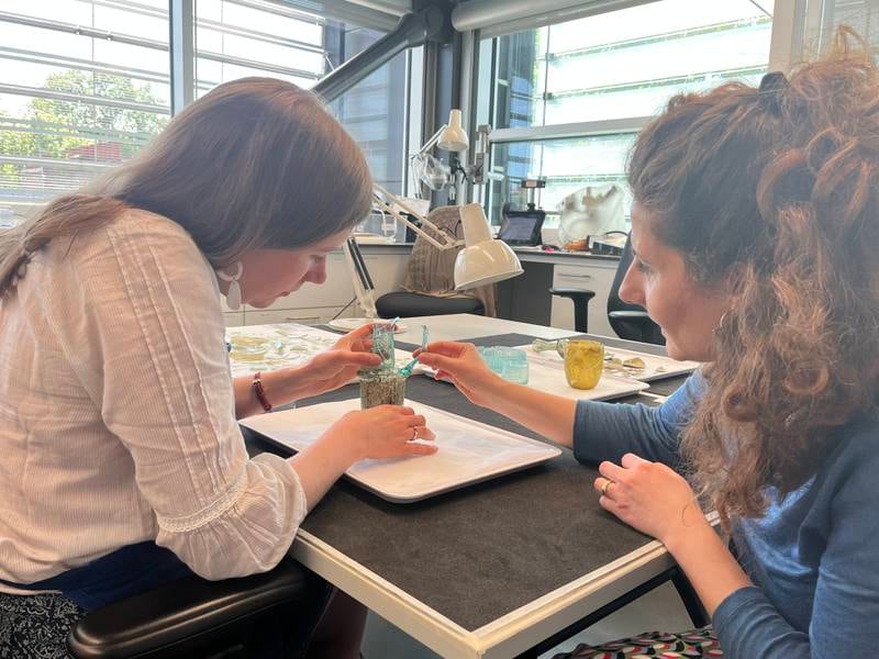 Conservators Claire Cuyaubere and Duygu Camurcuoglu work on a Byzantine jug, dating back to 400–500 AD. Photo: Trustees of the British Museum and the American University of Beirut