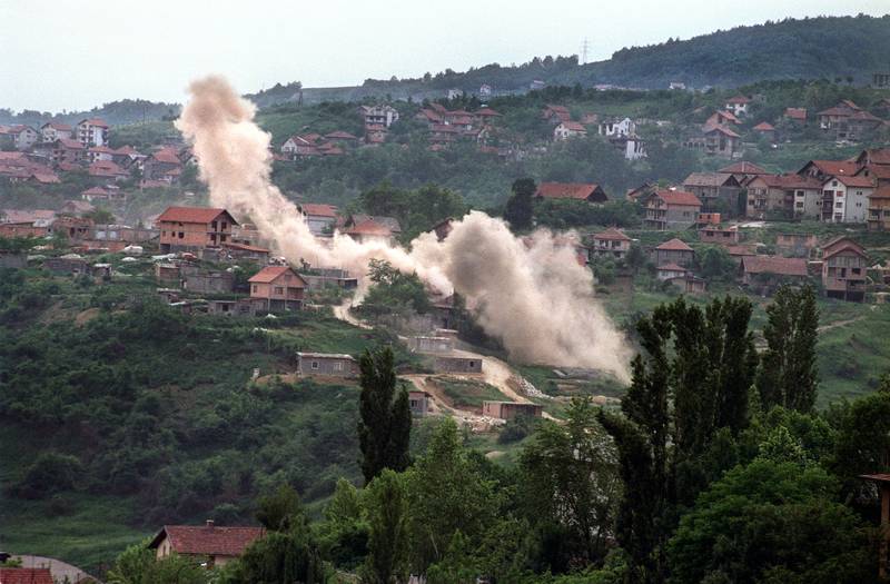 Houses in the suburbs of Sarajevo on June 6, 1992, hit by heavy shelling by Serbian forces perched on the hills around Sarajevo. Georges Gobet/AFP