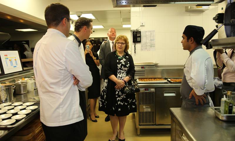 Barbara Leaf, US ambassador to the UAE, visits the kitchen before the Discover America dinner at Ray's Grill.