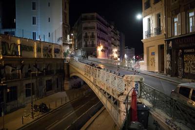 Empty streets are pictured after curfew in Marseille. AP Photo