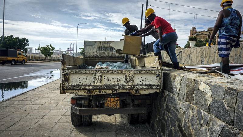 Workers remove shards of glass and debris at the Kingsbury Hotel in Colombo, Sri Lanka, April 22, 2019. Jack Moore / The National. 