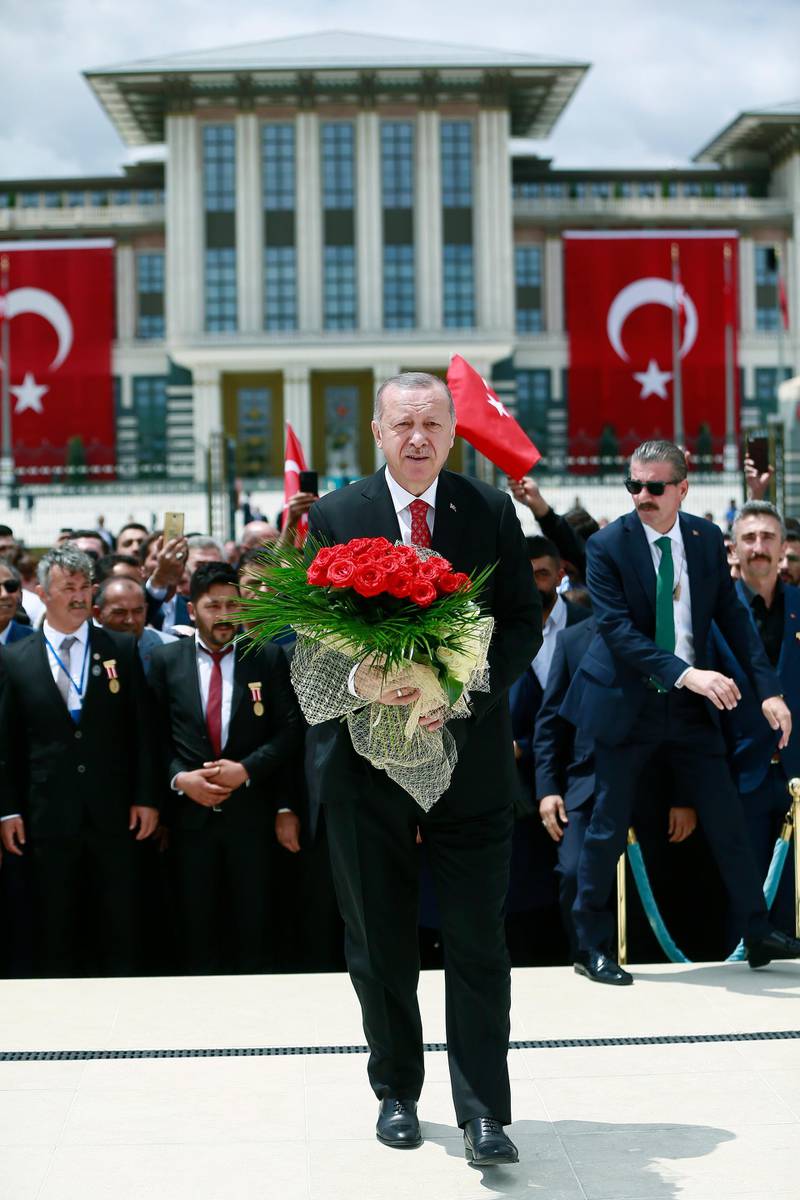 Turkish President Recep Tayyip Erdogan (C) visiting Martyrs Memorial on the third anniversary of the failed coup attempt at the Presidential Palace in Ankara, Turkey.  EPA