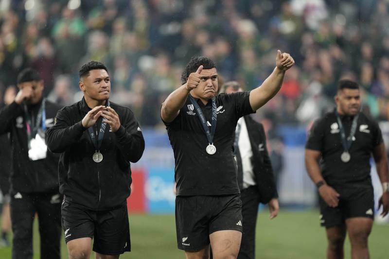 New Zealand's players salute supporters after losing the final. AP