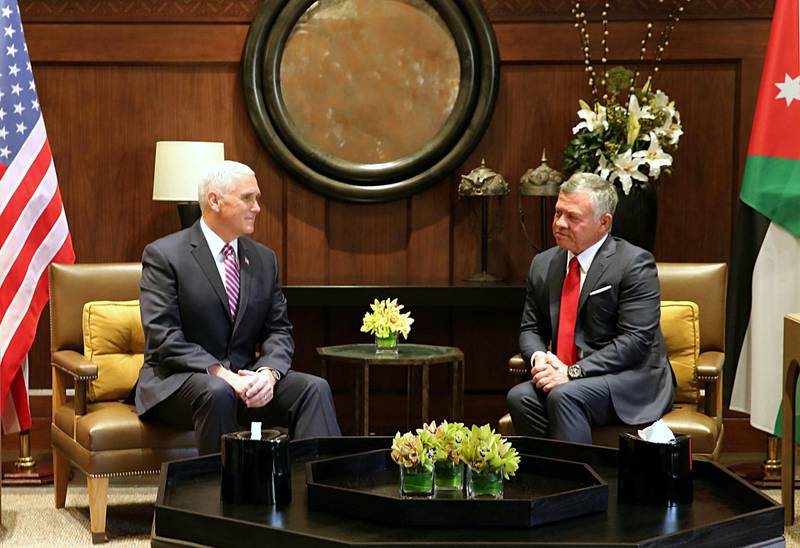 epa06460358 King Abdullah II of Jordan (R) meets with US Vice President Michael Pence at the Royal Palace, Amman, Jordan, 21 January 2018. US Vice President pence arrived to Jordan on 20 January evening after traveling to Egypt, he is due to continue his middle east trip by visiting Israel after his meeting with King Abdullah II of Jordan.  EPA/AMEL PAIN