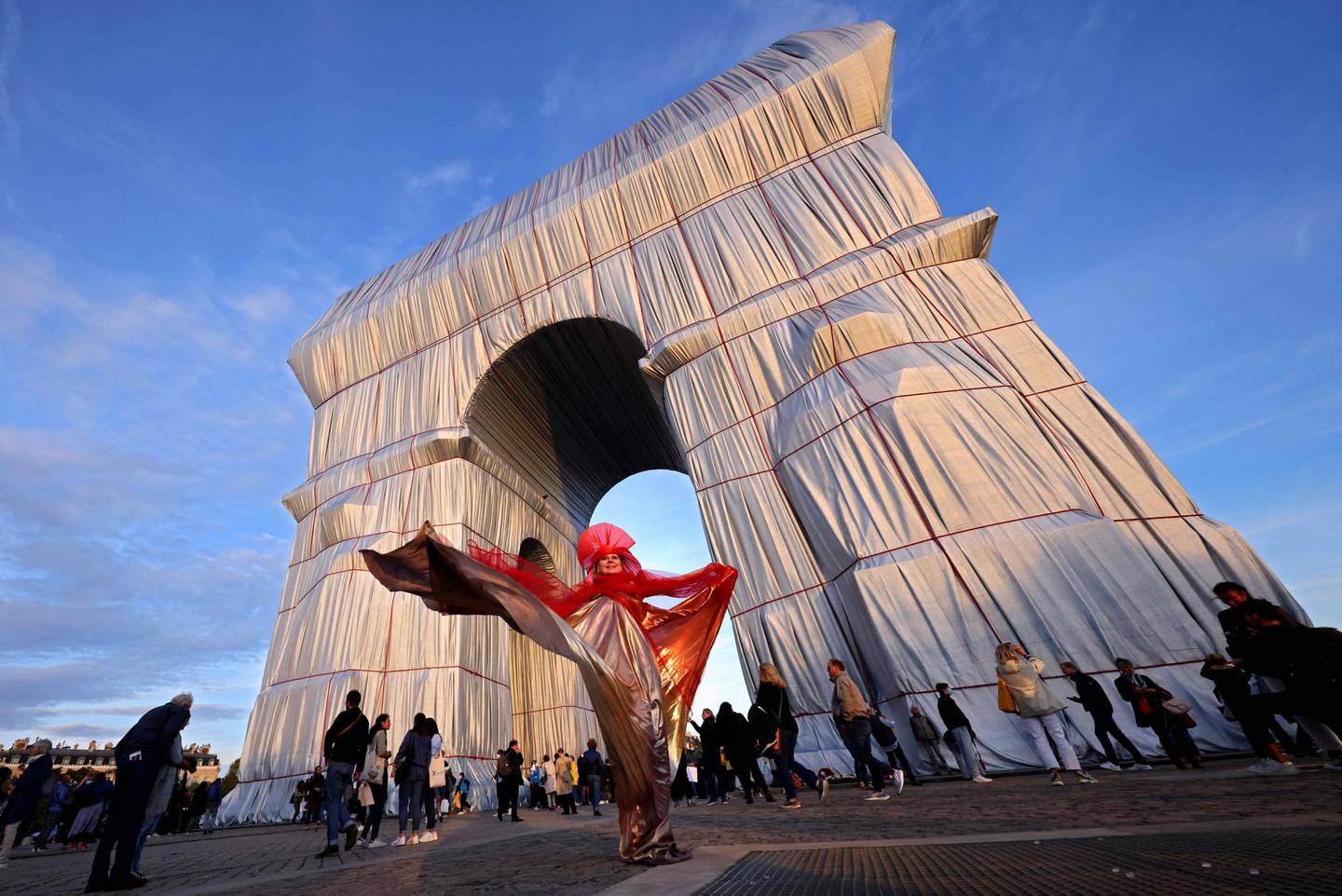 'L’Arc de Triomphe, Wrapped' seen in silver-blue fabric, as it was designed by late artist Christo. AFP