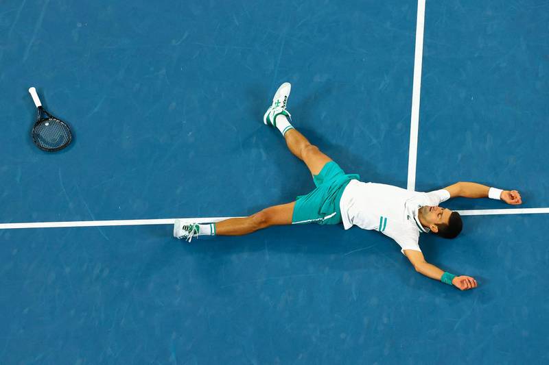 Serbia's Novak Djokovic celebrates after beating Daniil Medvedev of Russia in straight sets to win the Australian Open at Melbourne Park on Sunday, February 21. AFP