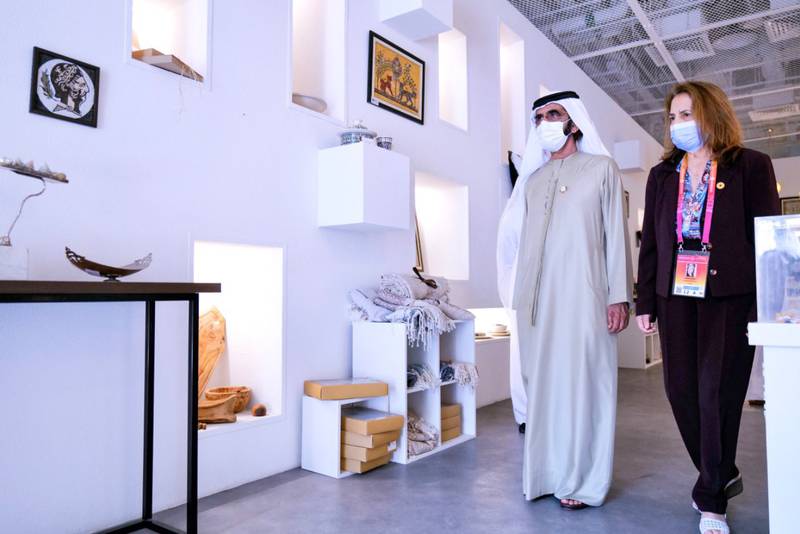 Sheikh Mohammed visiting the Tunisia pavilion, which symbolises the innovations and creativity of the country's youth. 