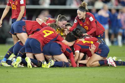 Spain celebrate their victory over England at the final whistle. AP 