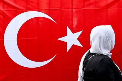 A woman in Berlin queues to cast her vote in the Turkish general elections. EPA