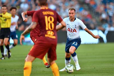 Tottenham's Christian Eriksen looks to pass under pressure. AFP