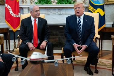President Donald Trump speaks during a meeting with Israeli Prime Minister Benjamin Netanyahu in the Oval Office of the White House, January 27, 2020, in Washington. AP