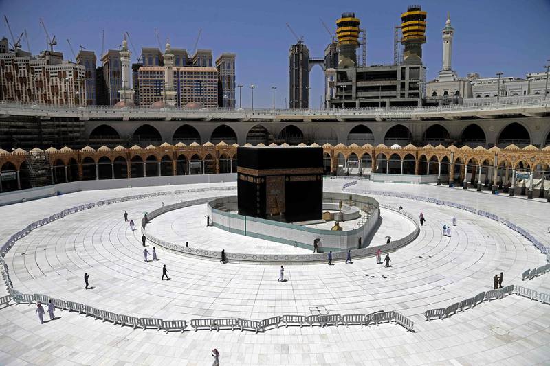 Muslim worshippers circumambulate the sacred Kaaba in Makkah's Grand Mosque, Islam's holiest site, on April 3, 2020. AFP