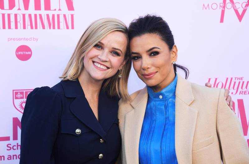 Reese Witherspoon and Eva Longoria attend the Hollywood Reporter's annual Women in Entertainment Breakfast Gala in Los Angeles, California, U.S., December 11, 2019. REUTERS/Phil McCarten