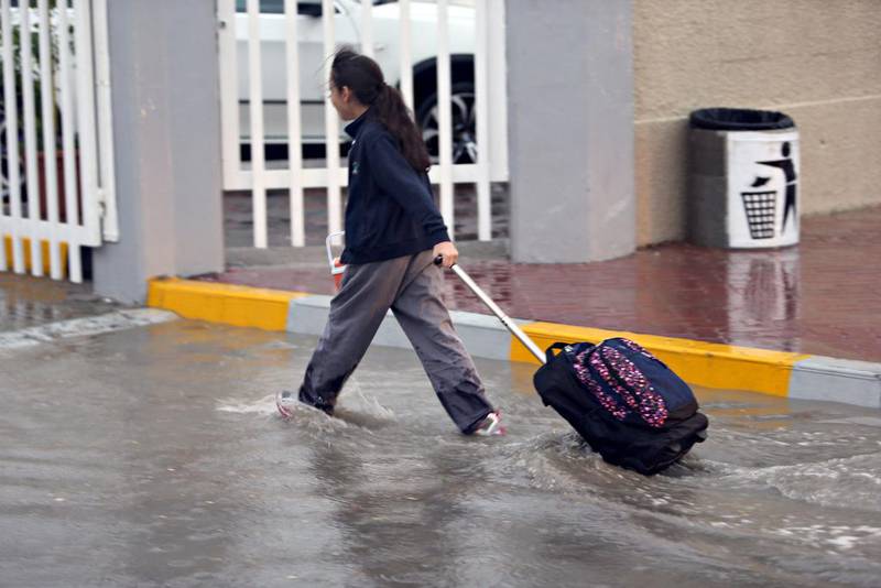 Heavy rain swept over Abu Dhabi Thursday morning as commuters went to work and school. Sammy Dallal / The National 






