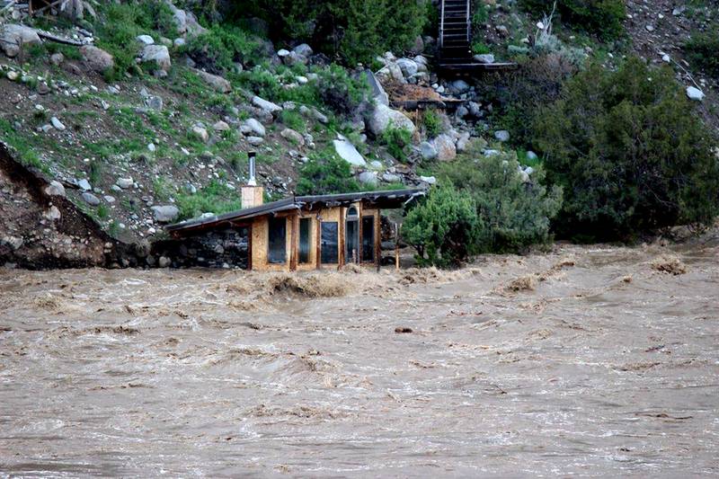 The fast-rushing Yellowstone River flooded what appeared to be a small boathouse in Gardiner, Montana. Sam Glotzbach / AP