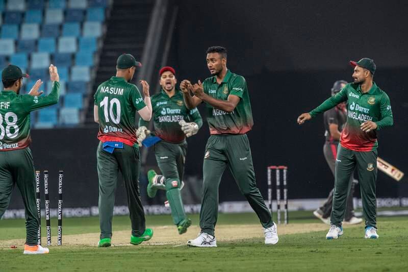 Bangladesh celebrate a wicket against the UAE.
