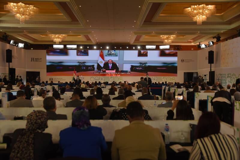 A speech recorded by Egyptian President Abdel Fattah El Sisi is shown at the International Co-operation Forum in Cairo. Photo: Ministry of International Co-operation