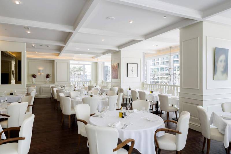 The dazzling white interiors of the French eatery La Serre Bistro and Boulangerie in Dubai. Courtesy La Serre