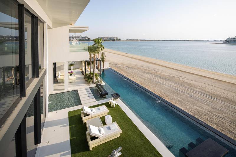 The infinity pool leads down to the private beach. Courtesy Luxhabitat Sotheby's International Realty
