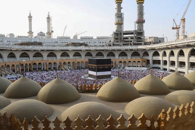 Worshippers gather before the Kaaba, the sacred cube-shaped building at the centre of the Grand Mosque. AFP