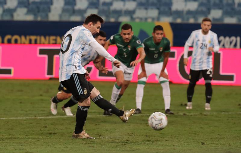 Argentina's Lionel Messi kicks a penalty. EPA