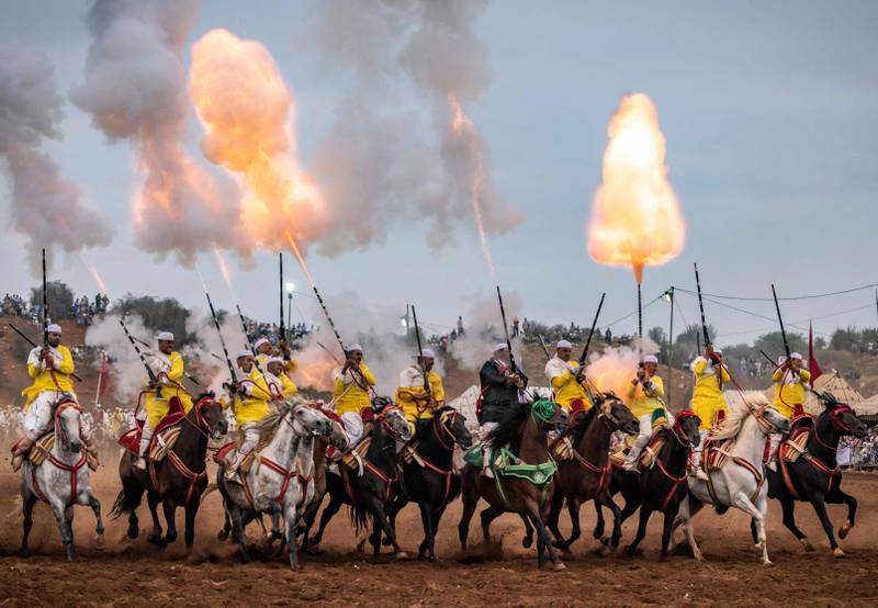 Moroccan horsemen perform traditional horse riding during a Moussem culture and heritage festival in the capital Rabat.