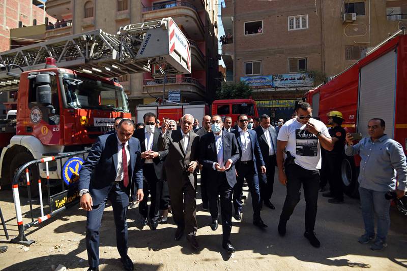 Egypt's Prime Minister Mostafa Madbouly visits the Abu Seifein church, which was gutted by a blaze blamed on an electrical fault. AFP