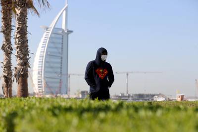 Dubai, United Arab Emirates - Reporter: N/A. News. Weather. A man walks along the beach with a hoodie on as the colder weather sets in. Dubai. Tuesday, January 5th, 2021. Chris Whiteoak / The National