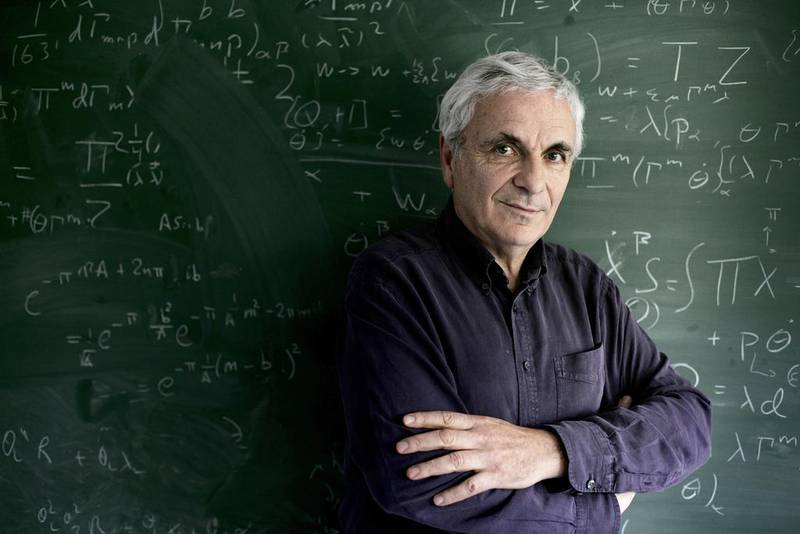 Michael Green, pioneer of string theory, Lucasian Professor of Mathematics and Professor in Department of Applied Mathematics and Theoretical Physics in his office at the University of Cambridge. Martin Godwin / Getty Images