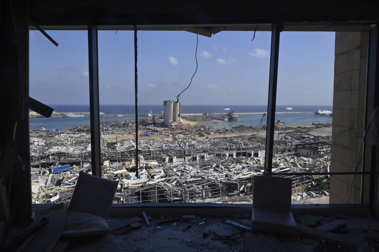 A picture taken from inside a damaged building shows the destroyed port area in the aftermath of the explosion in downtown Beirut. EPA / Wael Hamzeh 