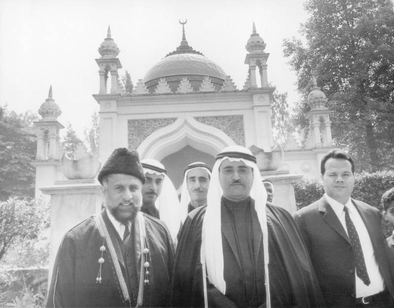 9th July 1968:  Sheikh Khalid bin Muhammad Al Qasimi, Ruler of Sharjah, with the Imam Misri (left) in front of the Shah Jehan Mosque in Woking, Surrey.  (Photo by Jim Gray/Keystone/Getty Images)