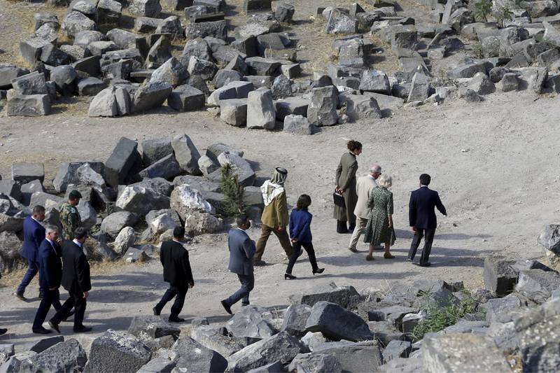 Prince Charles and Camilla tour the ancient site of Umm Qais in Jordan. AP