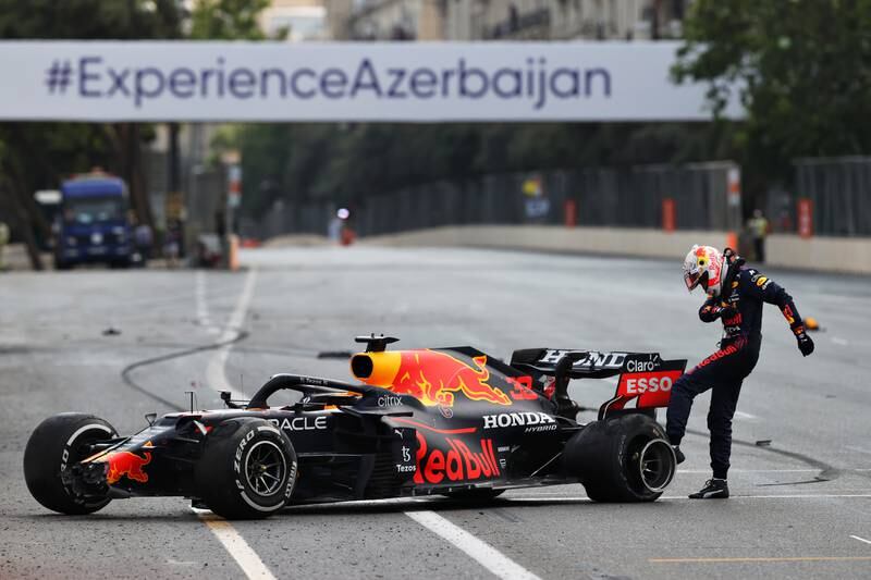 Max Verstappen of Netherlands and Red Bull Racing kicks his tyre as he reacts after crashing during the F1 Grand Prix of Azerbaijan at Baku City Circuit on June 06, 2021 in Baku, Azerbaijan. Getty Images