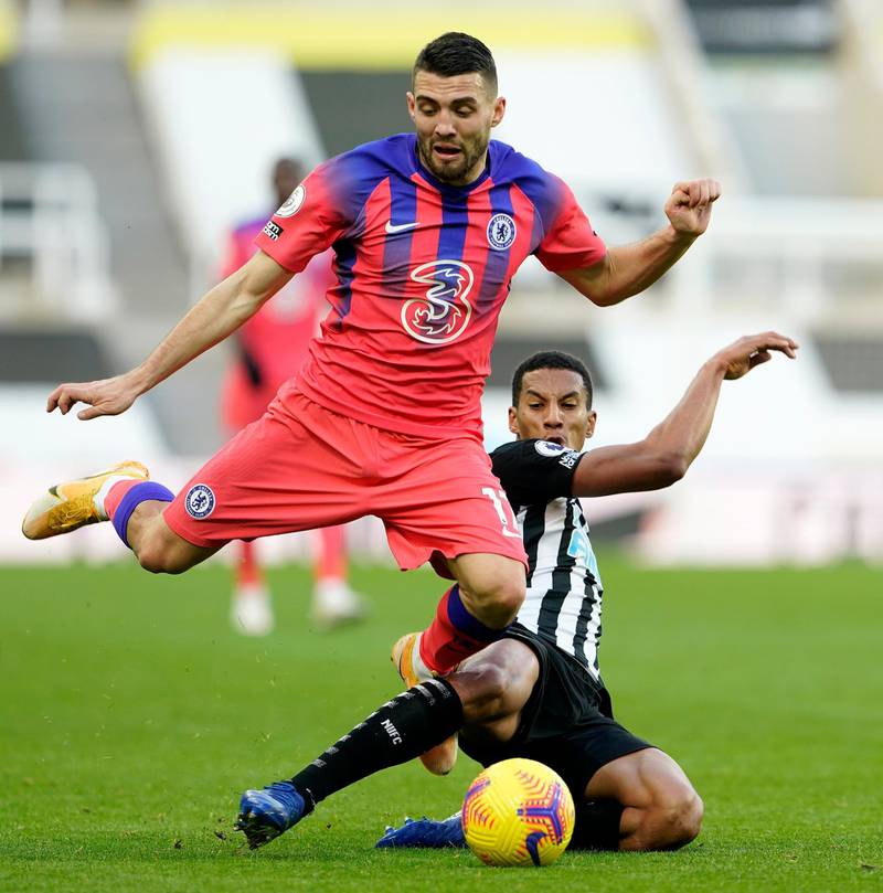 Mateo Kovacic of Chelsea is challenged by Isaac Hayden of Newcastle United at St. James Park on Saturday. Getty