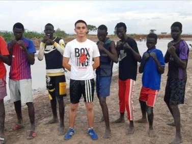 Afghan boxing champion teaches Kenyan camp refugees to punch above their weight 