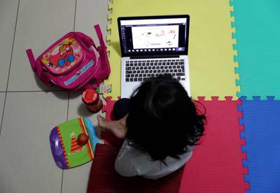 DUBAI, UNITED ARAB EMIRATES , April 9 – 2020 :- One of the student of FS 2 during the online class at her home in Masakin Al Furjan area in Dubai. All the schools are closed in the UAE as a preventive measure against coronavirus. (Pawan Singh / The National) For News/Online/Instagram.