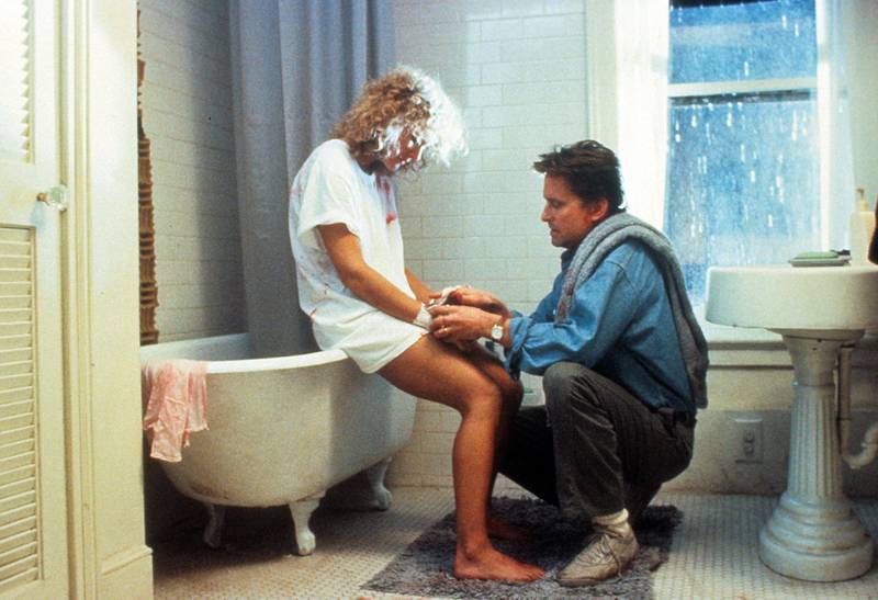 A bloodied Glenn Close is tended to by Michael Douglas in a scene from the film 'Fatal Attraction', 1987. (Photo by Paramount/Getty Images) *** Local Caption ***  AL02OC-CROWNS-FATAL.jpg