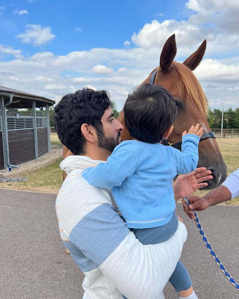 Sheikh Hamdan visited the F3 Stables in the UK with his son Sheikh Rashid, 1.
