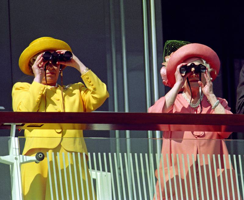Queen Elizabeth II and the Queen Mother watching the 1994 Derby at Epsom Racecourse. PA